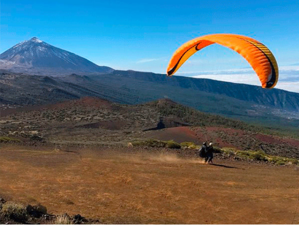 Vuelo en Parapente biplaza con transporte + fotos ¡A volar!